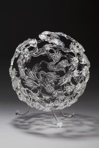 Glass sphere of tiny flame-worked hands, 2004, 7 x 8 x 7 inches