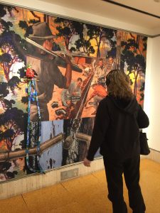 Gallery viewer and Open Veins collage with Quetzal bird sculupture